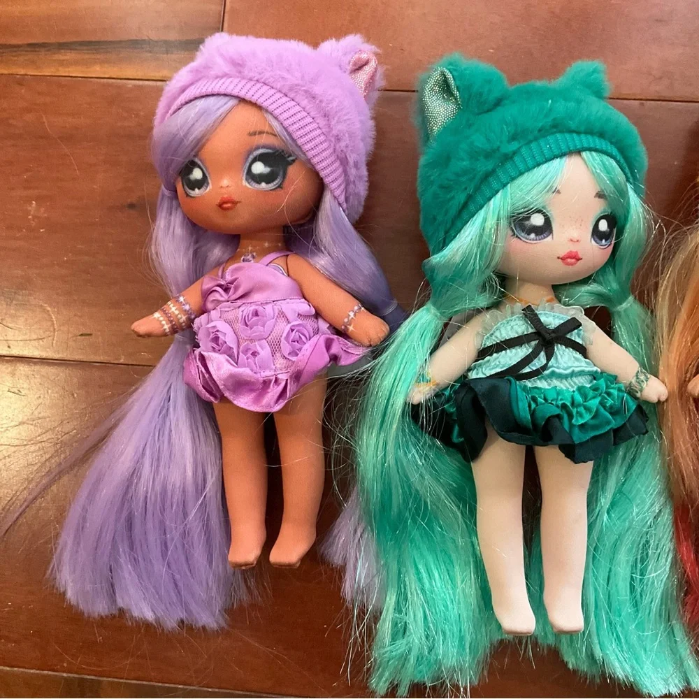 Lof of 4 Na Na Na Surprise Dolls